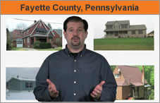 Photo of a man facing the camera, with images of four different houses behind him. The headline over the photo reads 'Fayette County, Pennsylvania.'