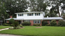 A photo of a home in a residential neighborhood.