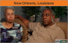 Photo of a man and a woman seated, with the man facing an interviewer off-camera, and the words across the top: New Orleans, Louisiana.
