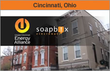 The SoapBox / Energy Alliance logo, over a photo of a building cluster. The headline over the photo reads 'Cincinnati, Ohio.'