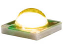 Photo of an LED: a bright semi-globe atop a square substrate.