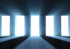 Photo of five open doorways with light shining through.