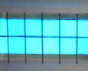 Photo of a light blue horizontal rectangle containing darker blue grid lines