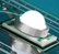 Photo of an LED on a circuit board.