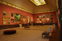 Photo of a museum gallery with LED lighting in track fixtures overhead.