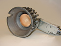 Photo of the front view of an unlit downlight with a coated dome.