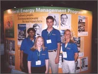 Photo of FEMP Staff standing in front of Energy 2002 Exhibit