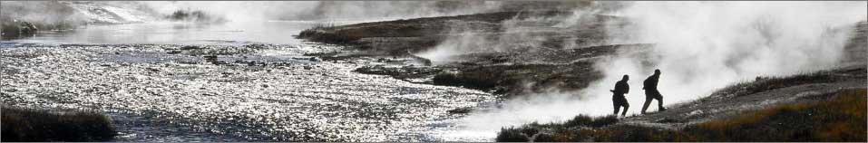Picture of geothermal landscape with 2 people walking