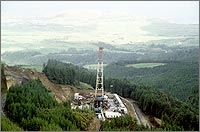 Photo of an oil drilling tower.