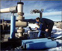 Photo of a researcher conducting a test at The Geysers