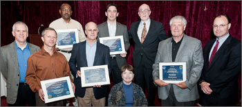 Photo of representatives from industrial companies certified to Superior Energy Performance displaying their awards at a recognition event with DOE and Texas Industries of the Future on Apr. 7, 2011 in Houston, Texas.