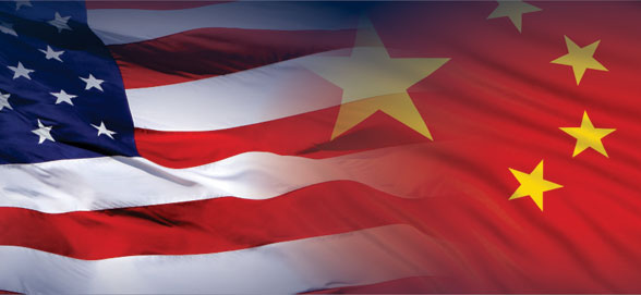 Picture of two flags, United States and China, fading into each other with the US flag on the left and the Chinese flag on the right.