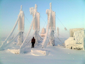 Photo of anemometers covered in ice.