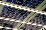 Photo of photovoltaic panels intergrated into the ceiling of a federal building.