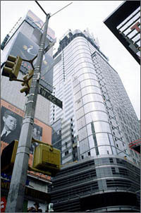 Photo of a 48-story New York City skyscraper, 4 Times Square, that was designed in the 1990s-and features a photovoltaic skin that includes thin-film PV panels.