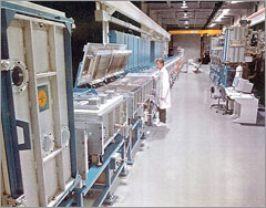 Photo of a 5-megawatt solar-cell production equipment at United Solar, built by Energy Conversion Devices (ECD), dedicated exclusively to triple-junction cell production. Photo of a 5-megawatt solar-cell production equipment at United Solar, built by Energy Conversion Devices (ECD), dedicated exclusively to triple-junction cell production.