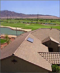 Photo of a roof of a house with an integral collector storage system.