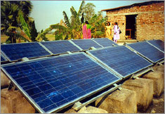 Photo of rooftop PV modules on a village health center in West Bengal.