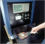 Photo of a single silicon water being sampled by a Photoconductor decay system.
