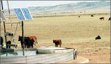 Photo of stock water pumps powered by PV in a remote location in Wyoming.