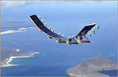 Photo of NASA's Helios prototype flying wing on its first test flight on solar power.