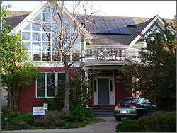 Photo of a Colorado home that has a 2-kilowatt solar electric system on its roof. The system is connected to the grid and meets nearly 100 percent of the homeowner's annual electricity needs. 