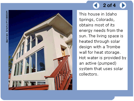 Photo of the exterior of a house with many large windows and a wooden staircase leading to the front door.  (Caption: This house in Idaho Springs, Colorado, obtains most of its energy needs from the sun. The living space is heated through solar design with a Trombe wall for heat storage. Hot water is provided by an active (pumped) system that uses solar collectors.)