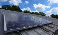 Photo of solar panels on a roof.