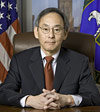 Photo of Secretary Steven Chu sitting at a desk.