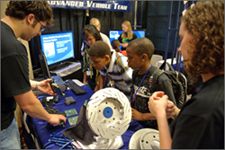 Students viewing demonstration of EcoCAR technology.