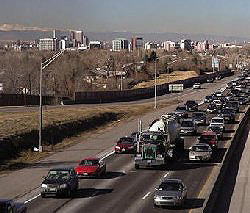 Photo of automobile traffic causing vehicle exhaust emissions.