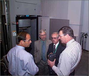Photo of Richard Ziegler of Oak Ridge National Laboratory conducting a tour of the National Transportation Research Center.