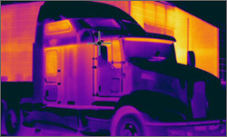 Photo of infrared camera imaging showing the heat loss in truck cabs.