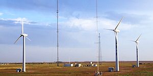 Photo of three wind turbines towers at the Scaled Wind Farm Technology Facility in Lubbock, Texas.