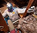 Photo of a home energy upgrade professional installing insulation