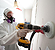 Photograph of weatherization worker