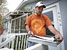 Photo of weatherization worker filling out paperwork