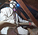Photograph of weatherization worker